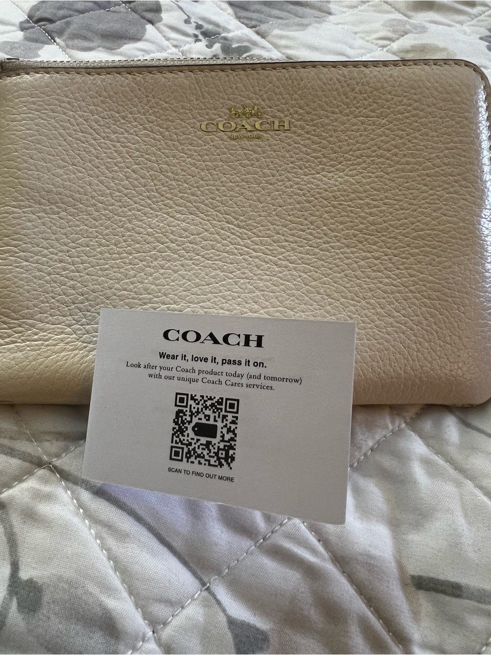 Coach Pebbled Leather Zip Wristlet in Light Cream with Gold Logo